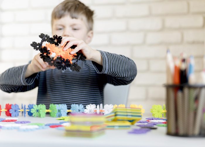 medium-shot-boy-being-creative